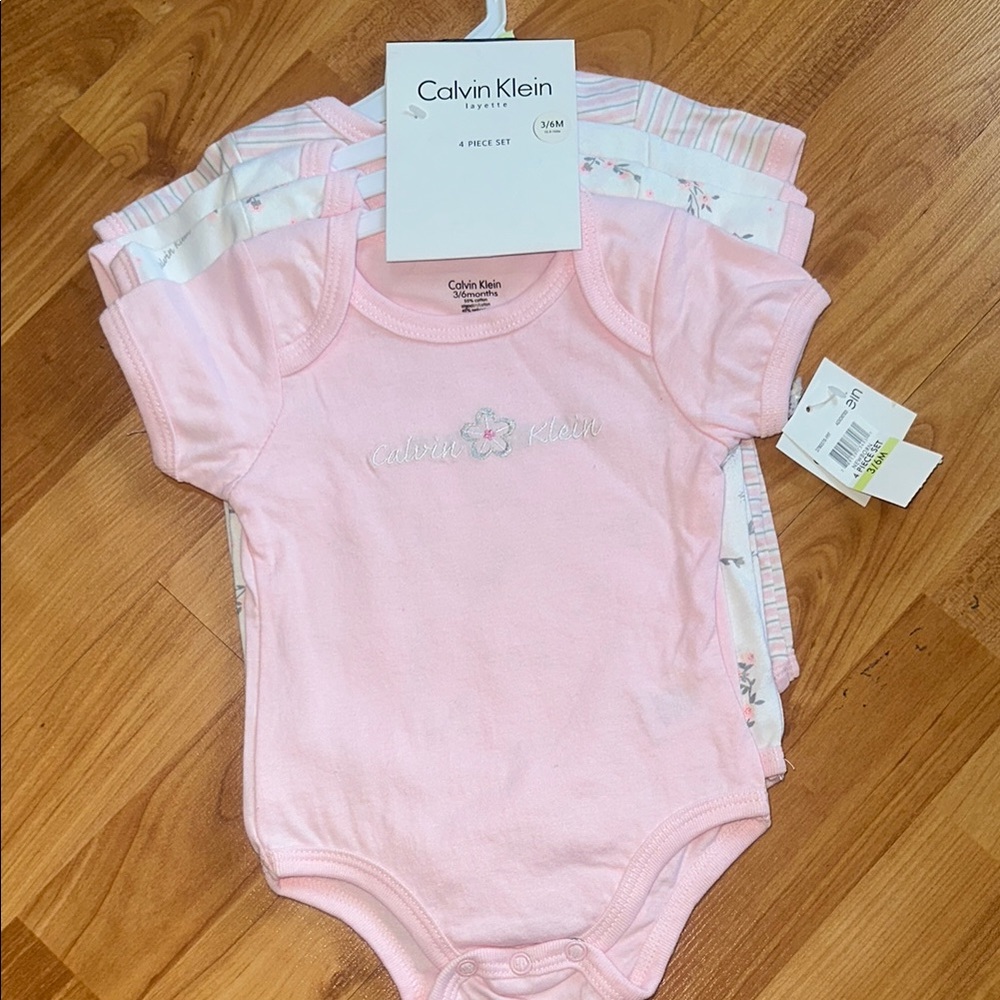 NWT size 3/6 Month Calvin Klein Baby Girl Onesie bodysuit pack of 4